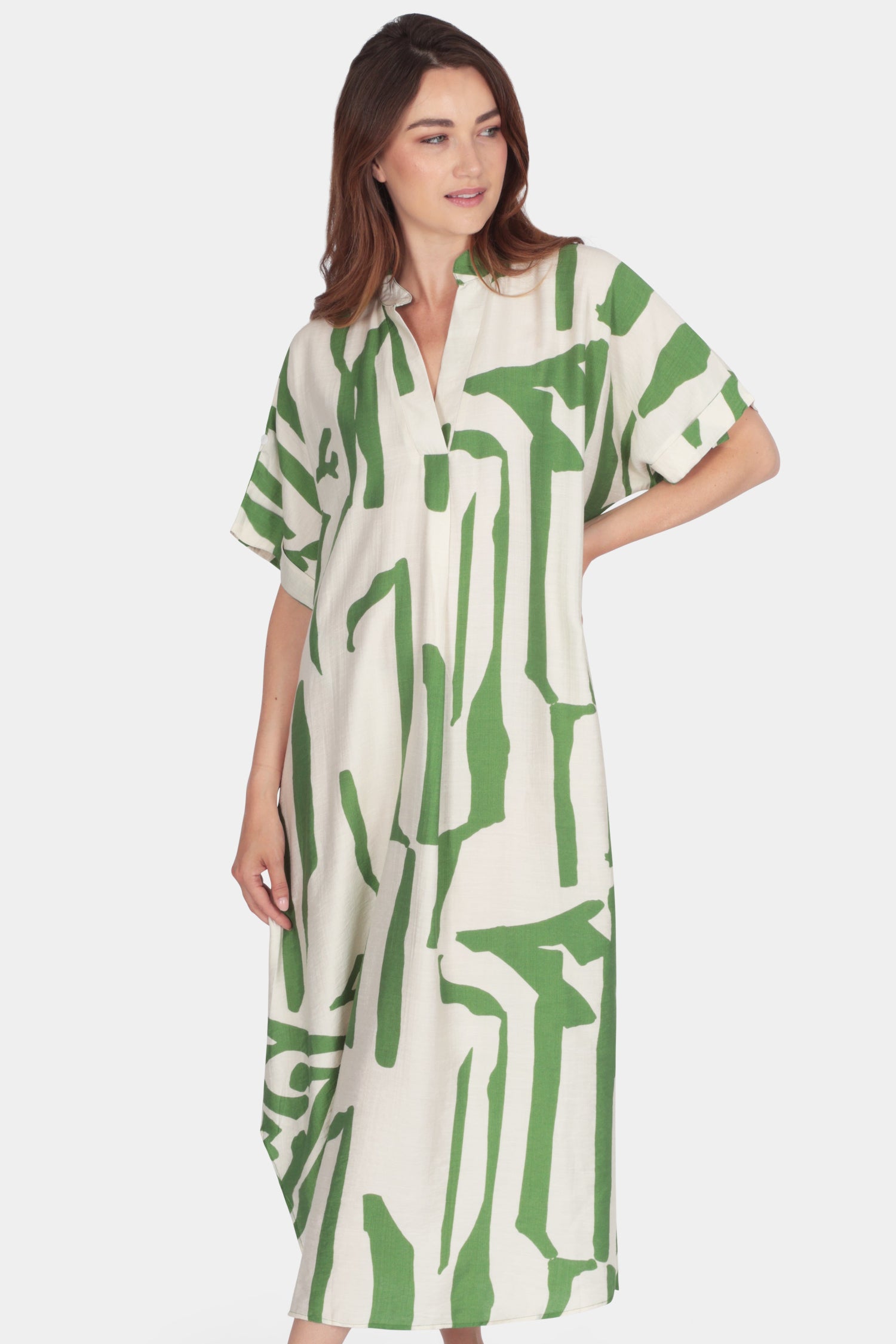 Brushstroke Relaxed Midi dress with green abstract print, V-neck band collar, short sleeves, and side pockets.