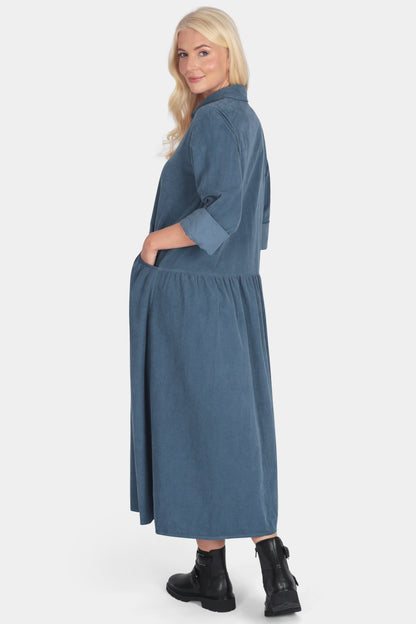 Woman wearing a blue dress