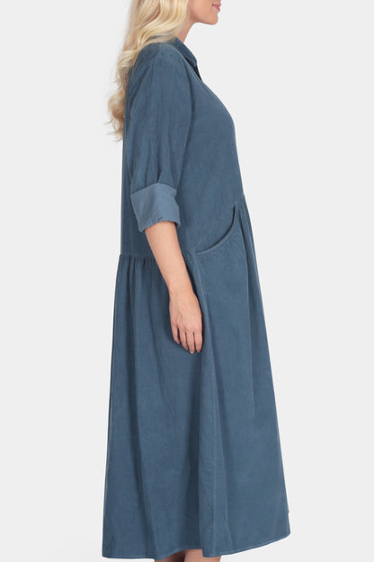 Woman wearing a blue dress 